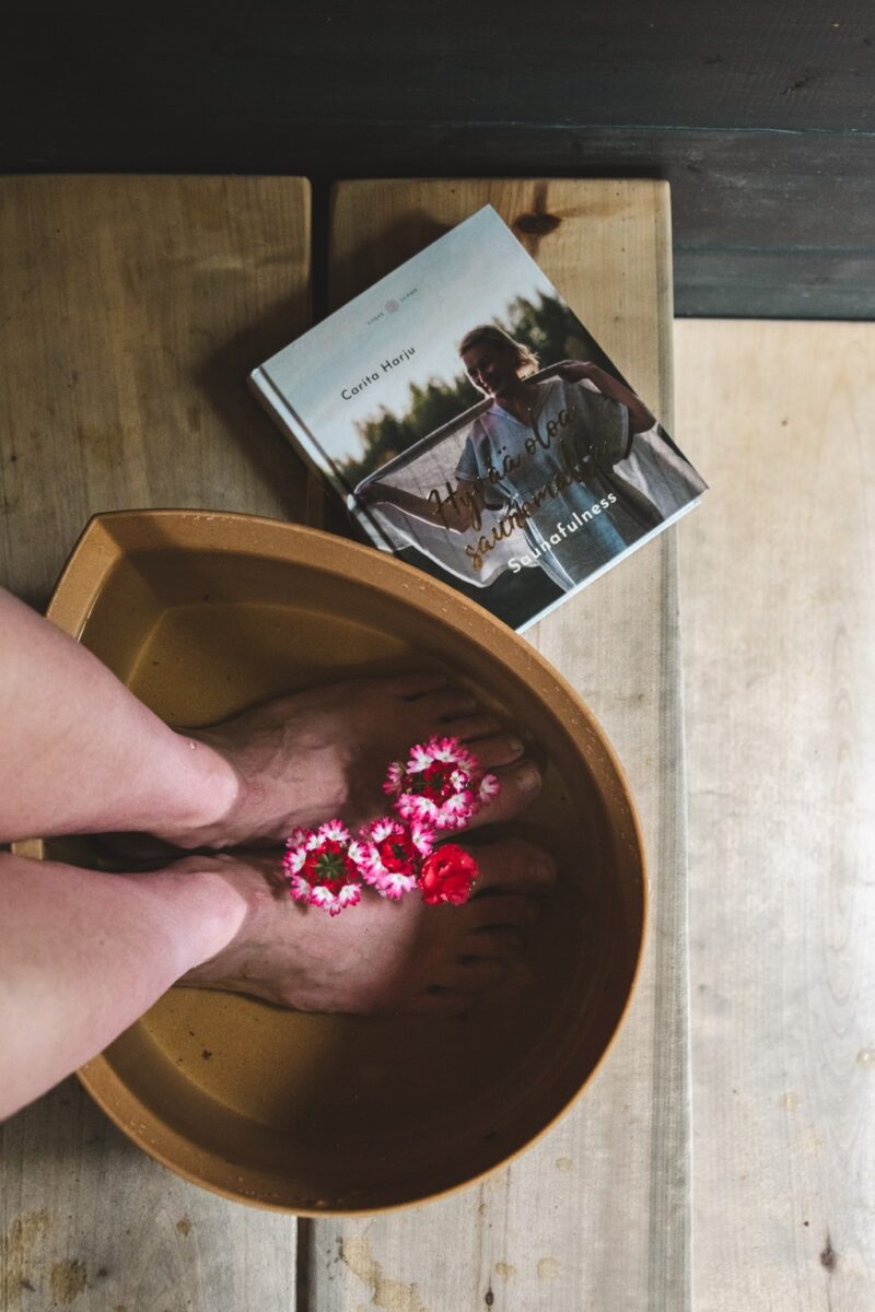 Having a footbath in a Finnish sauna.