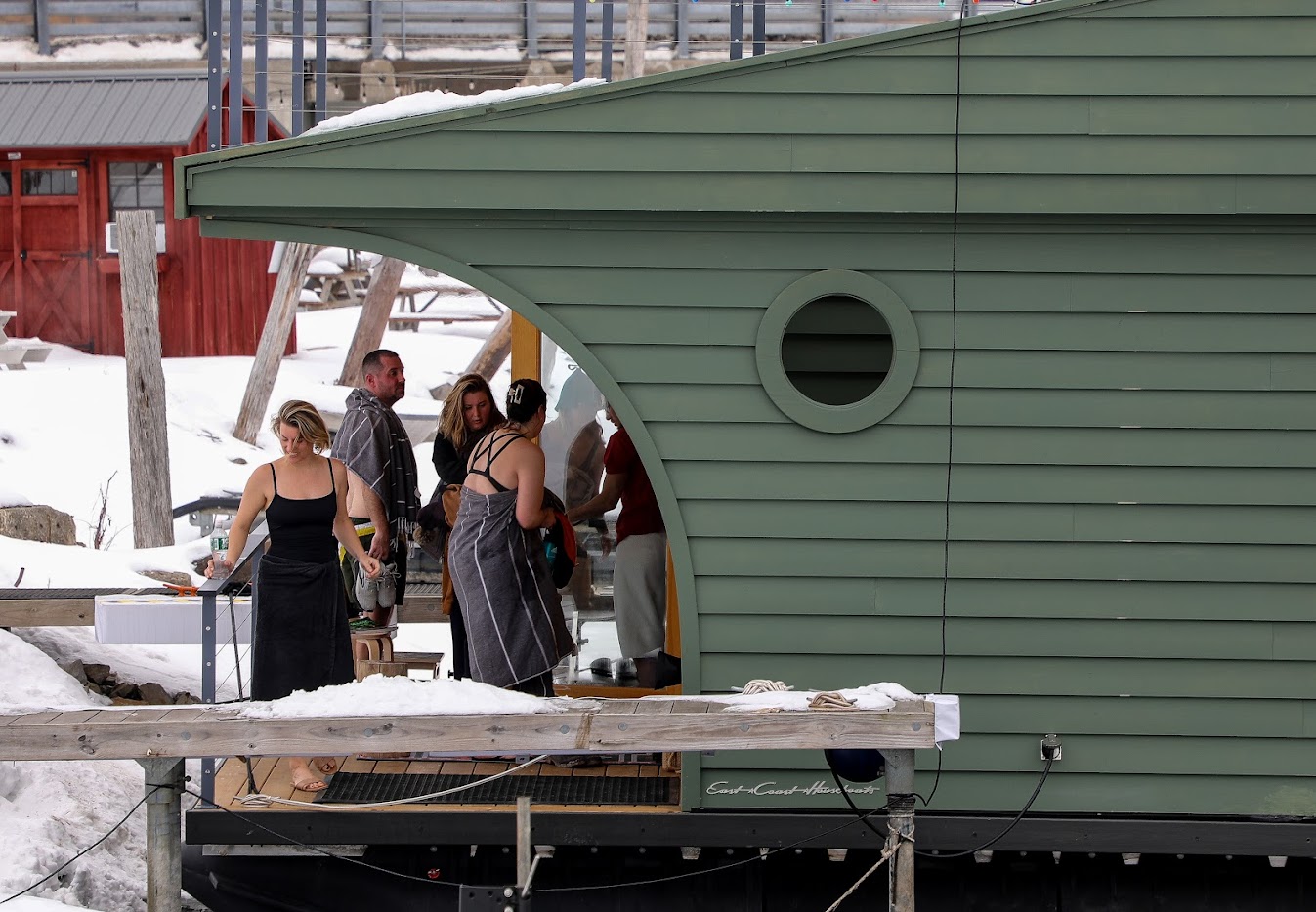 People at the floating KOS Sauna