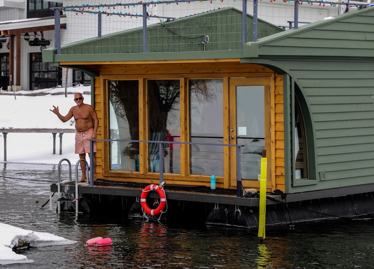 Person at the floating KOS Sauna
