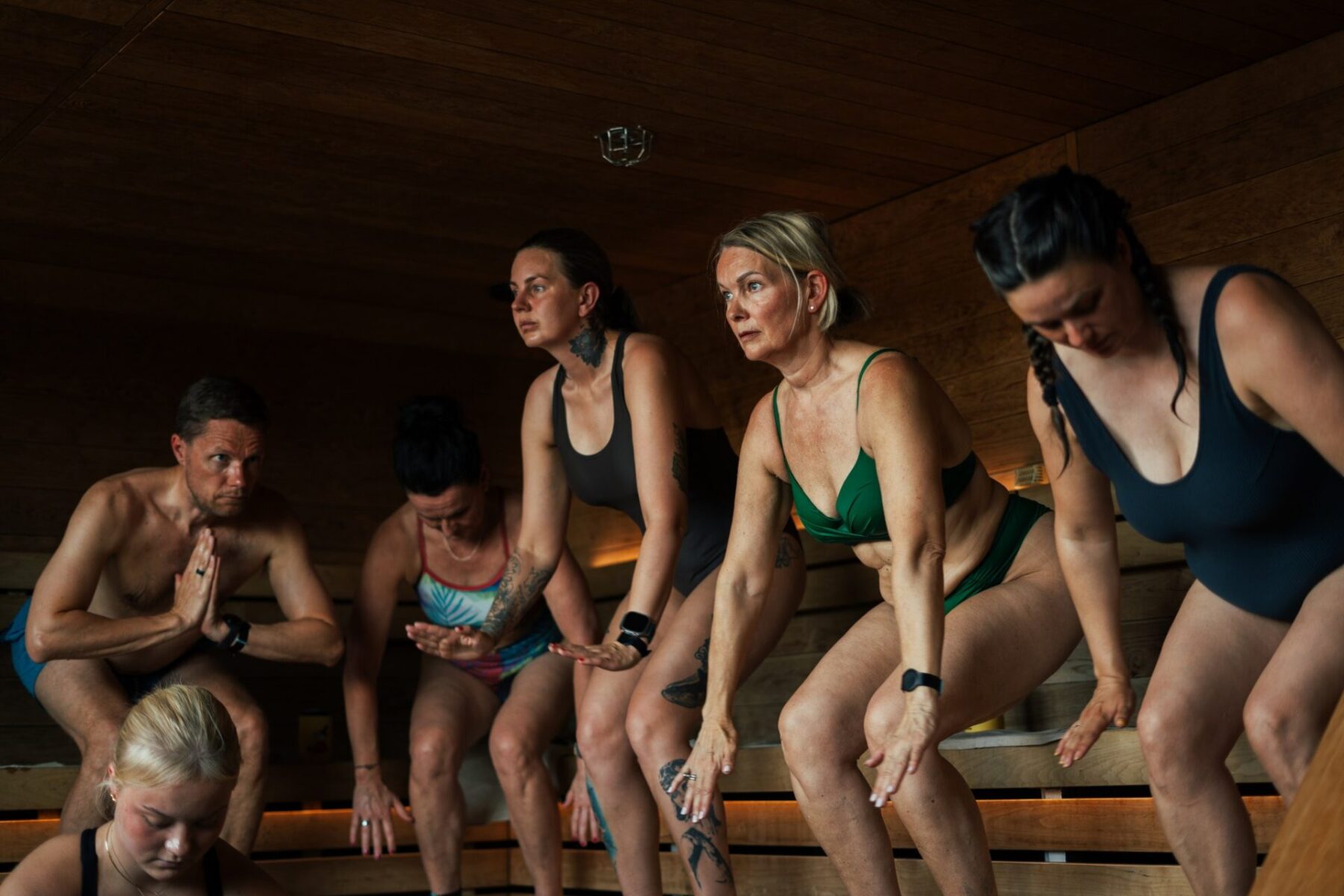People practicing sauna yoga at World Sauna Forum