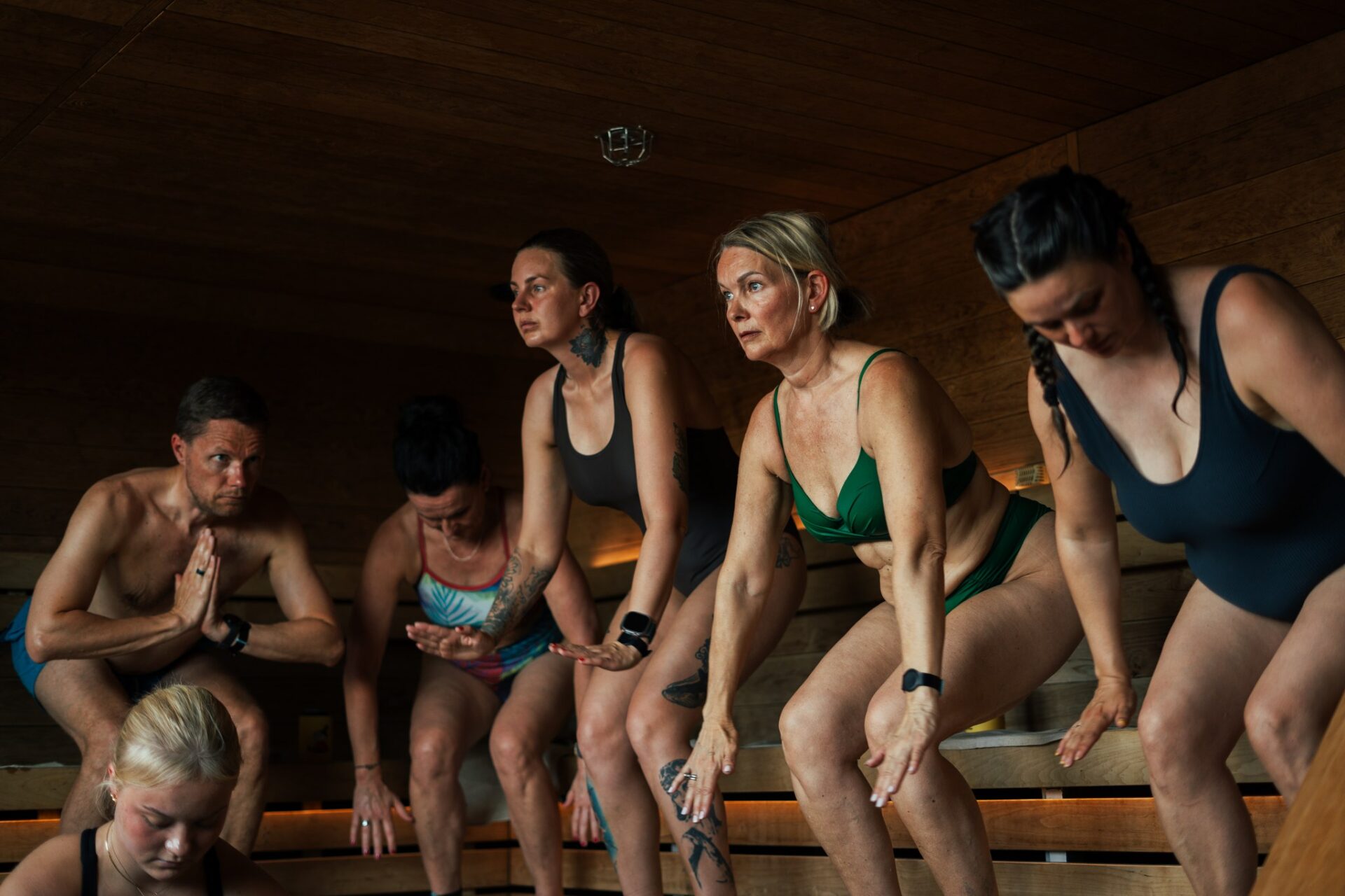 People practicing sauna yoga at World Sauna Forum